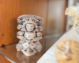 Carved stone Aztec figure statue