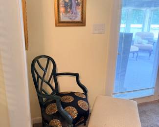 Upholstered floral armchair and ottoman
