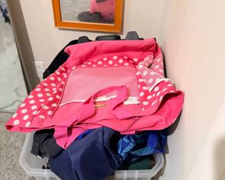Bin of tote bags and mirror