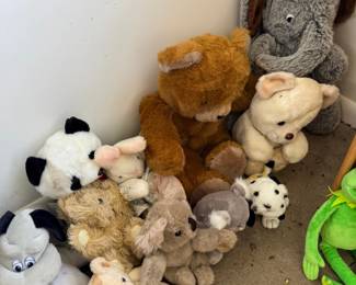 Pile of plush stuffed animals