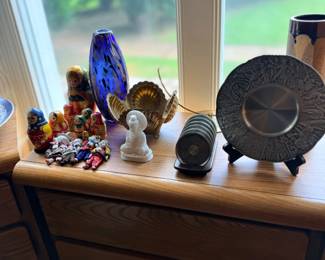 Art glass and decorative items on windowsill