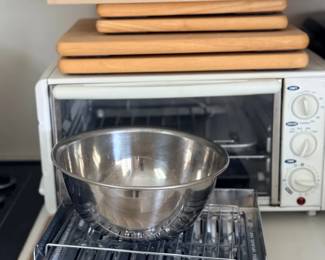 Toaster oven, bowl and cutting boards