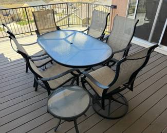 Outdoor Patio Dining Set with Glass Table, Six Chairs, and Side Table