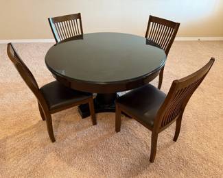 Contemporary Round Dining Table with Glass Top and Four Matching Chairs