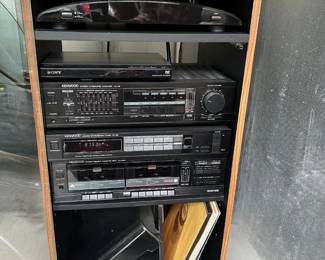 01 Vintage Kenwood Stereo System Rack With Speakers and Assorted LPs in Wood Cabinet