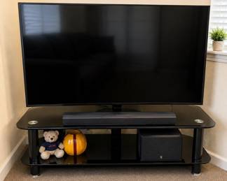 Samsung 75” Flat Screen TV with TV stand and sound bar included. Excellent condition with great picture quality. Clean and well maintaned. $650 OBO