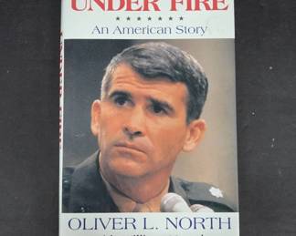 Signed by Oliver North Under Fire 