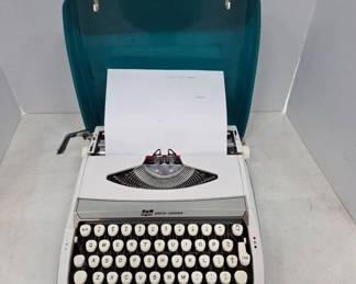 Smith-Corona Cougar Deluxe Typewriter