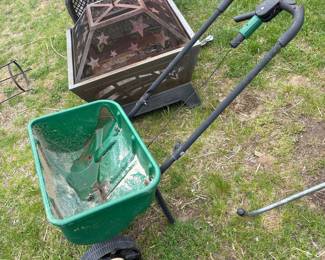 Scotts Turf Builder EdgeGuard Mini Broadcast Spreader and Star Pattern Fire Pit