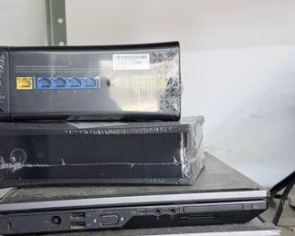 Charter Communications Spectrum Modem/Router and Laptops