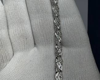 10K GOLD W/ OVER 200 BAGUETTE AND ROUND CUT DIAMONDS TENNIS BRACELET