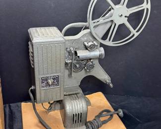 FULLY FUNCTIONING 16MM MOVIFONE PROJECTOR AND 4 MOVIE REELS