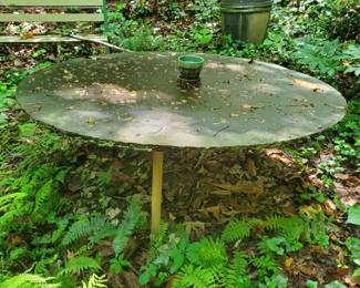 Custom vintage natural slate garden table, supported by three pedestal legs. Carved natural sculptal garden table from the 1970s.