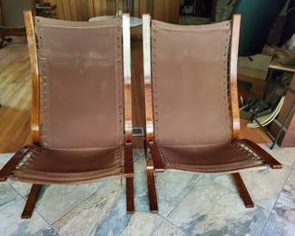 Two high back Westnofa Siesta Chairs.