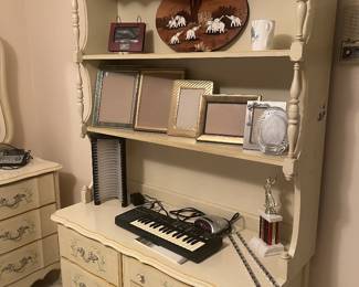 vintage bedroom set, desk, photo frames, keyboard