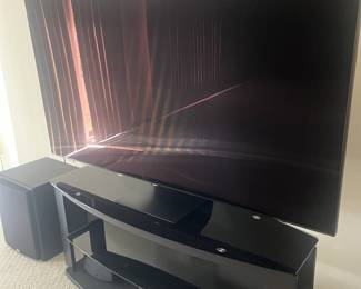 flatscreen tv and stand