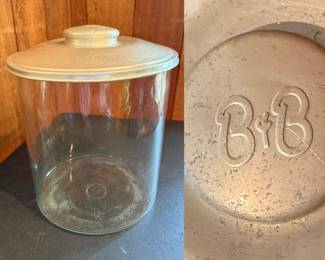  vintage clear glass canister with a aluminum lid, used for storage
