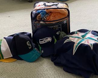 Assortment Of Sports Apparel Including Blanket