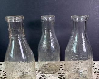 327 setof3embossedmilkbottles
