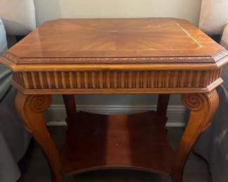 103 woodenendtablewithornatecarvingand