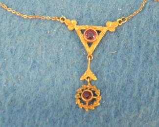 Lot 19. Vintage necklace in as is condition. Chain marked 10K. Total weight of 1.70 grams.