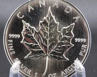 Lot 57. 1999 1-oz .9999 fine silver, Canadian Maple Leaf