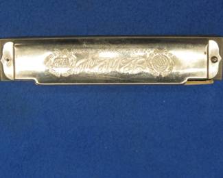Lot 49. F.A. Rauner "I like You" 40-hole diatonic harmonica in the key of C. Sounds great.