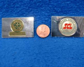 Lot 218. Two sterling silver ingots from "The Great American Railroad Emblems" series. The Seaboard Coast Line and the Southern. Total weight of 45.8 grams.