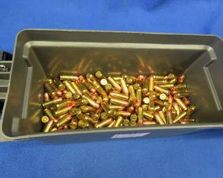 Lot 201. Hundreds of 9mm rounds in a plastic ammo can. Can and ammo weigh 18 lbs.