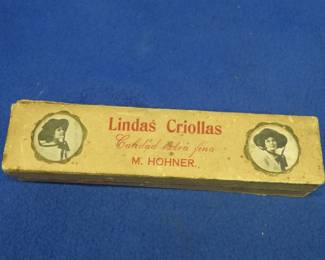 Lot 45. Hohner Lindas Criollas 80-hole diatonic harmonica in the key of B in the box in good condition.