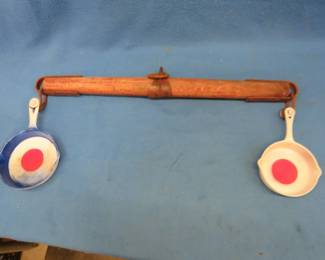 Lot 73. Homemade folk art shooting target made from a single tree and 2 cast-iron pans