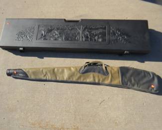 Lot 195. One Kolpin hard-sided and one soft-sided long gun case