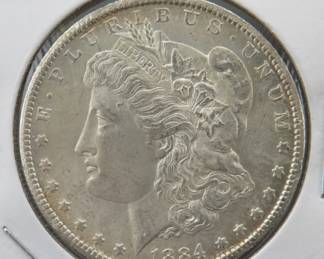 Lot 12. 1884 CC Morgan silver dollar