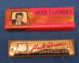 Lot 167. Herb Shriner's Hoosier Boy 10-hole diatonic harmonica in the box in excellent condition Sounds great.