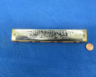 Lot 94. M. Hohner Polyphonia Chord Harmonica No. 4 in the keys of F, C, and G in the box. Box and harmonica are in excellent condition. Out of the huge collection of harmoni
