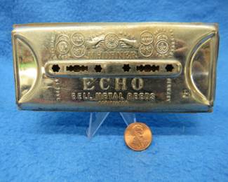 Lot 92. Hohner The Echo Harp 64-hole bell metal reeded double-sided tremolo harmonica in the box in the keys of F and B. The box and harmonica are in excellent condition. So