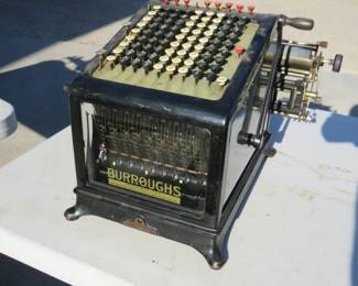 Lot 174. Burroughs adding machine with beveled glass on three sides