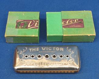Lot 41. Rauner The Victor 84-hole double-sided diatonic harmonica with the box in poor condition. Sounds great.