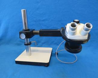 Lot 269. Bausch and Lomb StereoZoom 4 microscope with a light ring attachment (no power). AS IS