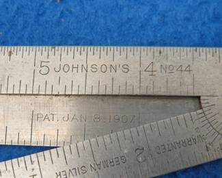 Lot 27. Johnson's No. 44 German silver folding ruler. Patented in 1907. 47.8 grams.