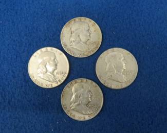 Lot 52. Four Franklin halves