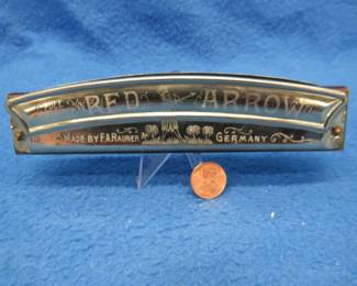 Lot 162. F.A. Rauner "Red Arrow" 40-hole full tremolo harmonica in the key of C in the box in excellent condition. Sounds great.