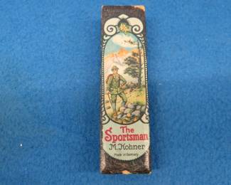 Lot 164. Hohner The Sportsman 32-hole tremolo harmonica in the box in VGC. Sounds great.