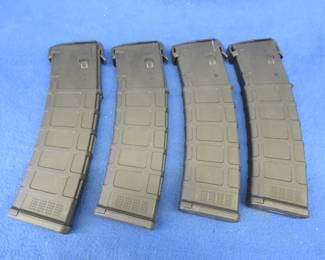 Lot 274. Four Magpul Pmag 40, 40-round 5.56 / .223 magazines