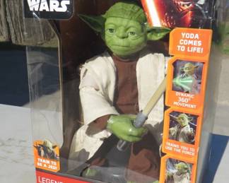 Lot 192. Star Wars Yoda appears to be new in box