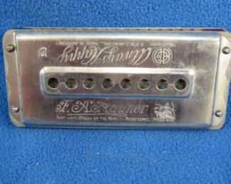 Lot 232. F.A. Rauner Always Happy 64-hole double-sided tremolo harmonica in the keys of A and D in the box in good condition. Sounds great. Minimum bid $20.