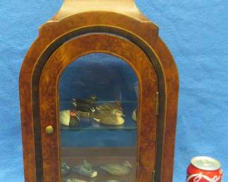 Lot 133. Display case with glass on all sides. Includes miniature duck collection.