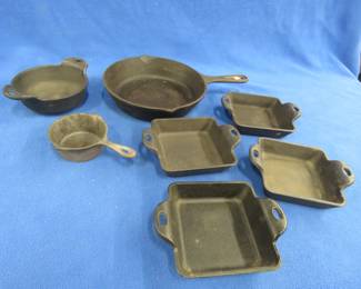 Lot 35. Lodge Ware cast-iron pans in a variety of shapes and sizes