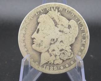 Lot 55. 1889 O Morgan silver dollar