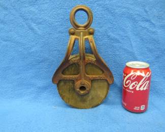 Lot 265. Wooden pulley with an iron frame. Hudson Mfg. Co.